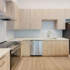 a kitchen with white countertops