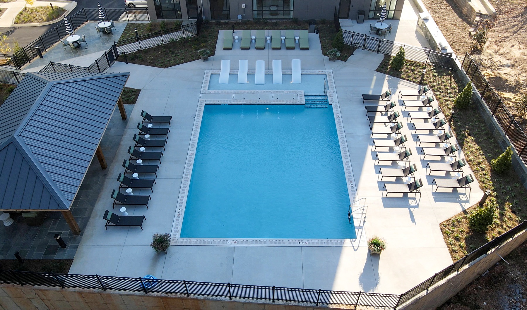 Sparkling swimming pool a pool surrounded by sun beds